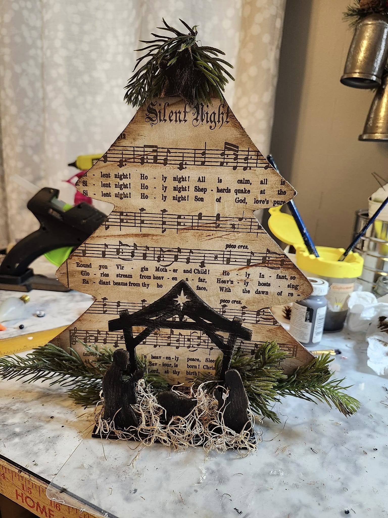 20 Beautiful Music Sheet Crafts to Add Harmony to Your Home Silent Night Nativity Music Sheet Craft