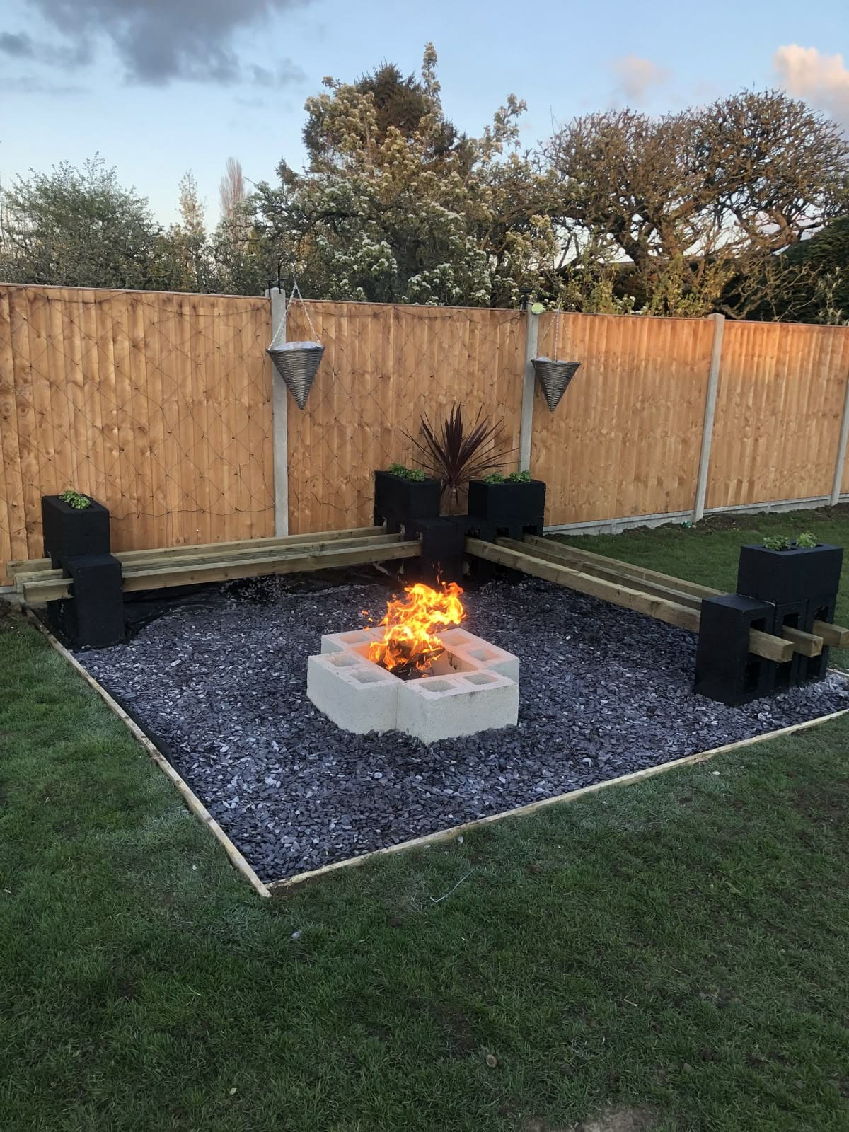 Simple Cinder Block Fire Pit with Cozy Seating Corner