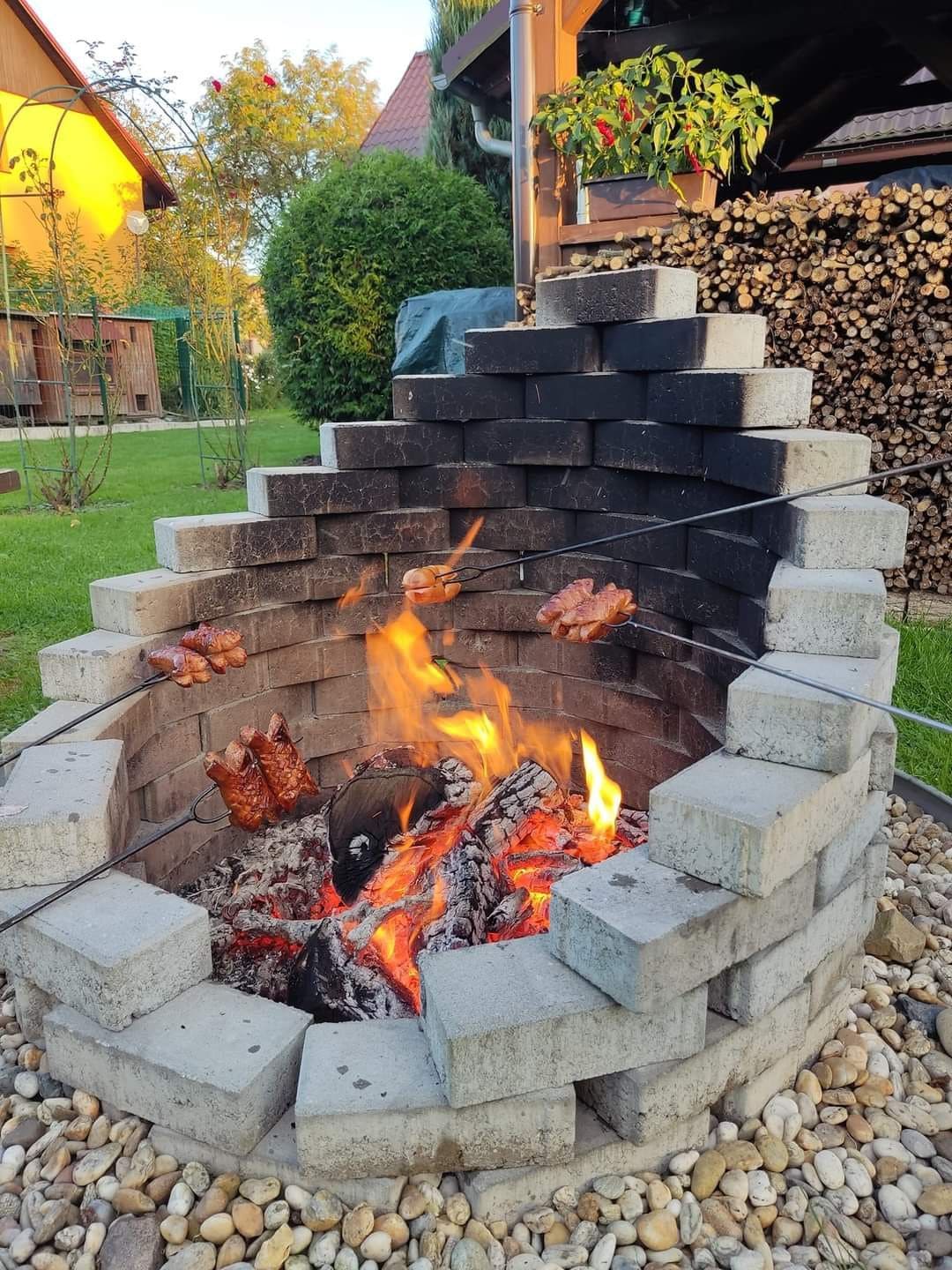 Tiered Brick Fire Pit with Heat Wall