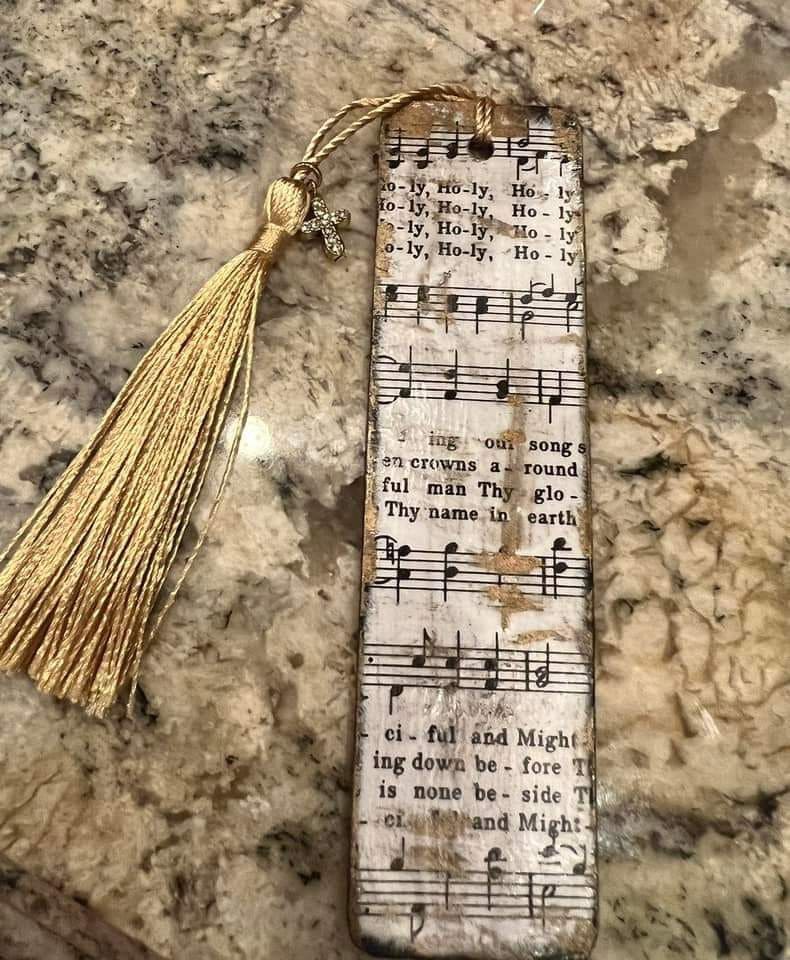 20 Beautiful Music Sheet Crafts to Add Harmony to Your Home Vintage Music Sheet Bookmark with Tassel