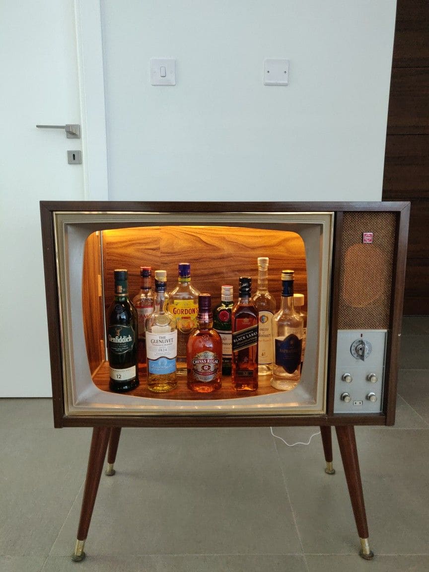 12 Old TV Makeovers to Give Nostalgia a Modern Twist Vintage TV Mini Bar Cabinet