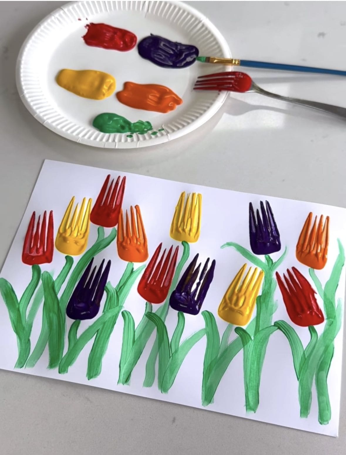 20 Simple DIY Printing Projects Made With Things You Already Have Fork Tulip Print Painting